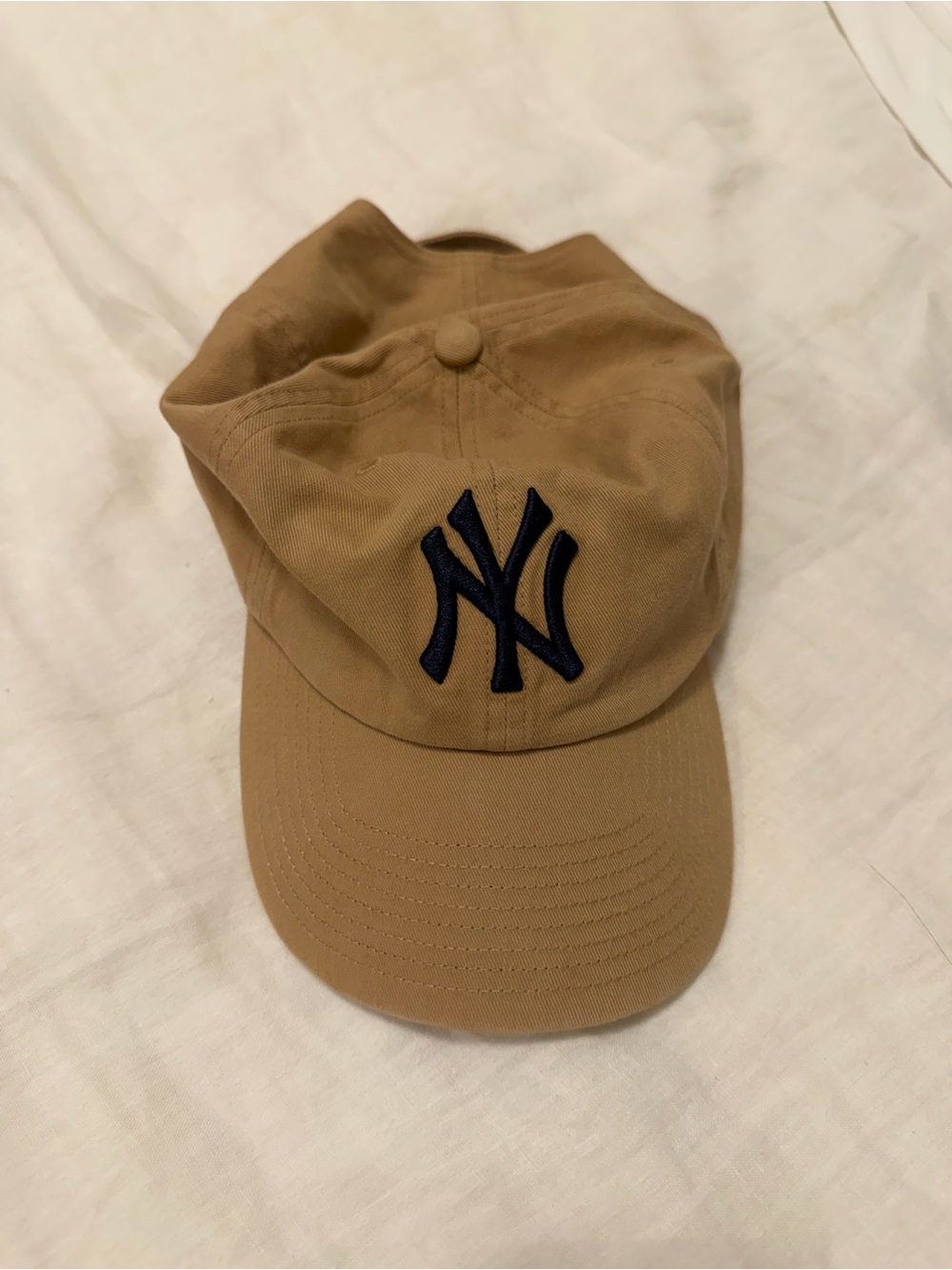 Tan Baseball Cap with Navy Logo